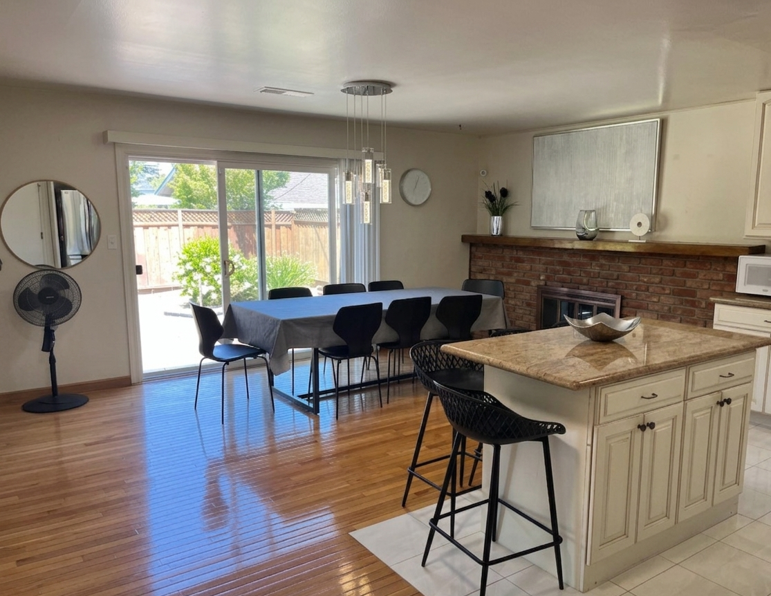 Open kitchen with island and dining area